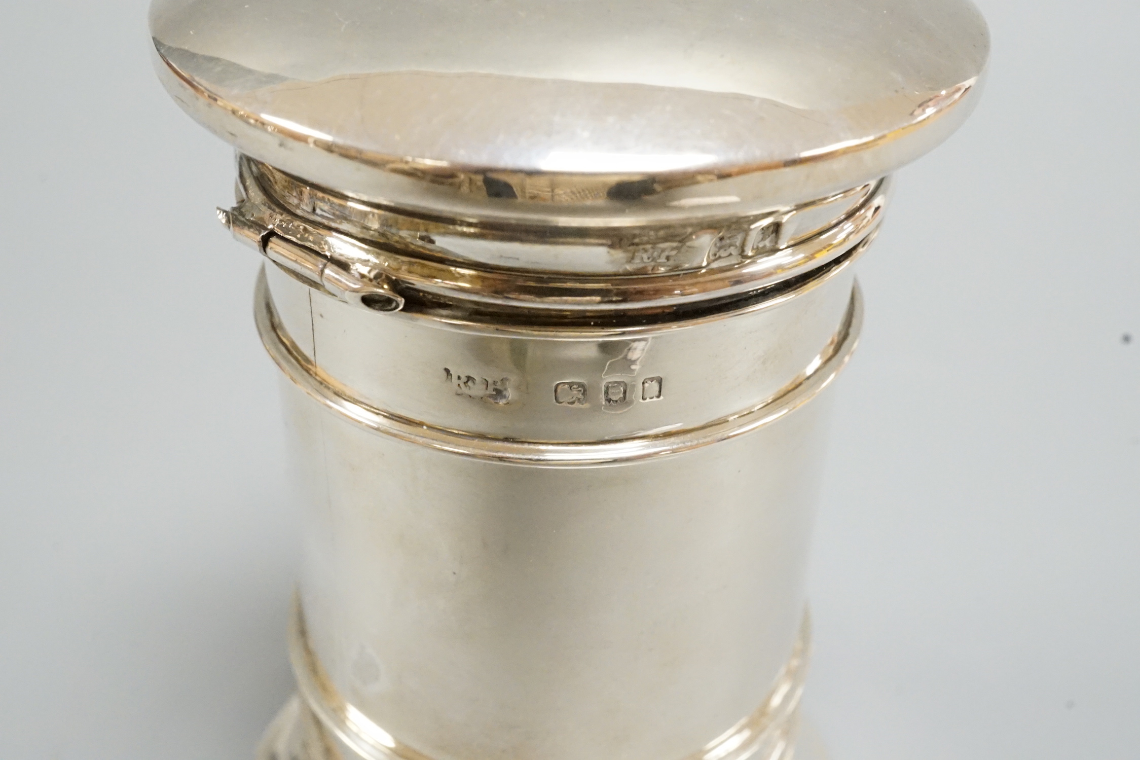A George V silver 'postbox' money box, with associated? padlock, no key, Robert Pringle & Sons, London, 1926, height 10.2cm.